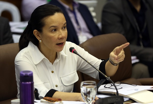 Comelec division disqualifies Senator Grace Poe for running in the 2016 Presidential election